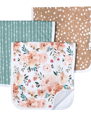 Three baby blankets with different patterns on a white background