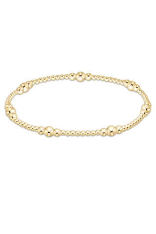 Gold bracelet on a white background