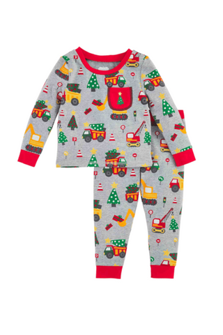 A two-piece children's pajama set featuring a long-sleeve top and matching pants in heather gray with a festive holiday construction theme. The print includes construction vehicles, Christmas trees, and a red chest pocket with a Christmas ornament, finished with red trim on the collar, cuffs, and hem.
