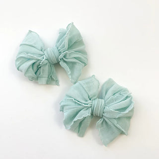 In Awe Ruffle Clip Bow Piggy Sets