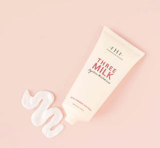 Three Milk by FHF skincare product on a pink background