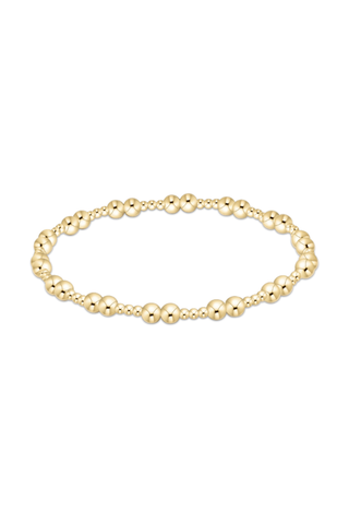 Gold bracelet on a white background