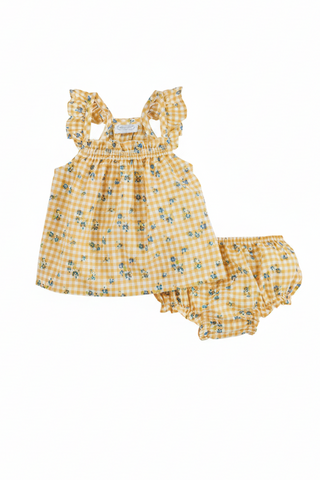 Yellow checkered baby dress with matching bloomers on a white background