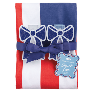 Packaged beach set with red, white, and blue stripes and blue bows on a white background