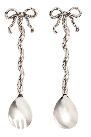 Silver spoon and fork with decorative bows on a white background
