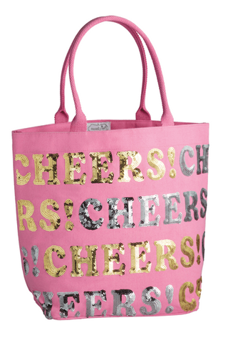 Pink tote bag with 'CHEERS!' text in gold and silver on a white background