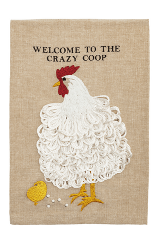 Embroidered towel with rooster design and 'Welcome to the Crazy Coop' text on a beige background