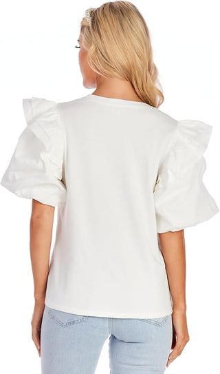 Woman wearing a white blouse with ruffled sleeves on a white background