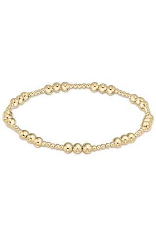 Gold bracelet on a white background
