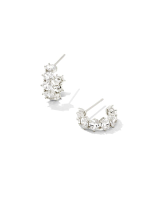 Pair of silver hoop earrings on a white background