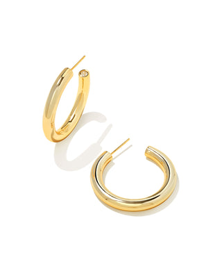 Gold hoop earrings on a white background