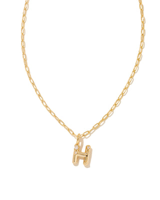 Gold necklace with a 'H' pendant on a white background