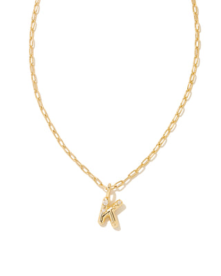 Gold necklace with a letter 'K' pendant on a white background