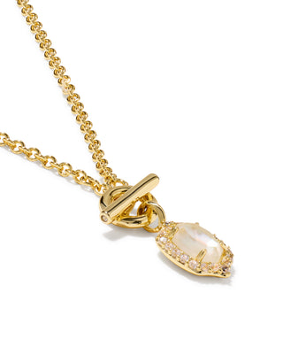 A gold chain necklace with a toggle clasp and a teardrop-shaped moonstone pendant, accented with small clear stones in a halo setting, shown on a white background.