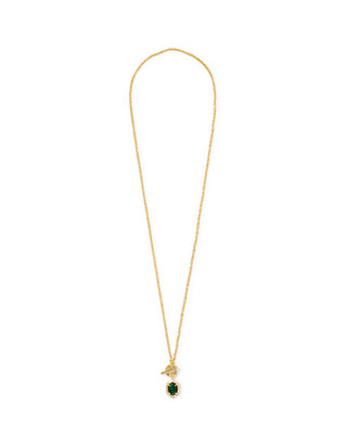 A delicate gold chain necklace featuring a small gold pendant with a green marquise-cut gemstone, displayed on a clean white background.