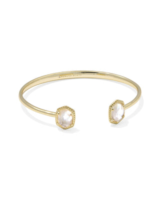 Gold bracelet with mother of pearl on a white background