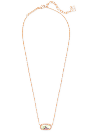 Gold necklace with an iridescent pendant on a white background