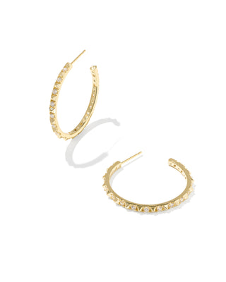 A pair of gold hoop earrings with small clear stones set along the front, displayed on a clean white background.