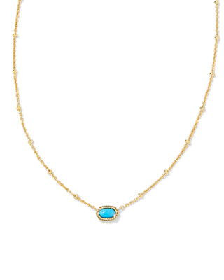 Gold necklace with a blue pendant on a white background