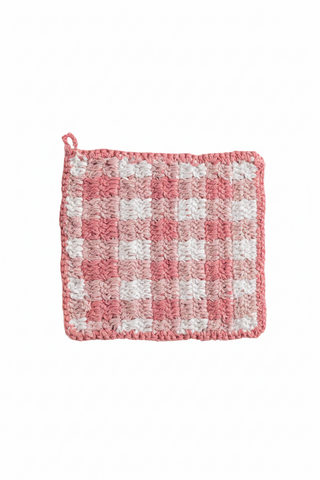 Pink and white checkered potholder on a white background