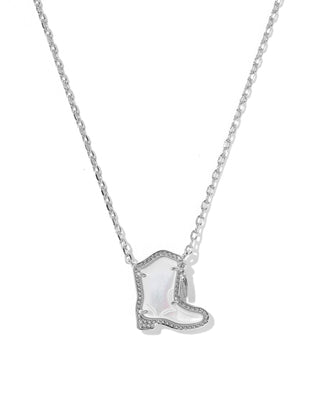 A silver-toned necklace featuring a cowboy boot pendant with a white mother-of-pearl inlay and small clear rhinestone accents along the outline, shown against a plain white background.