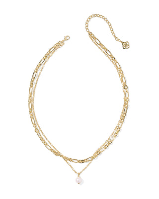 Gold necklace with a pendant on a white background
